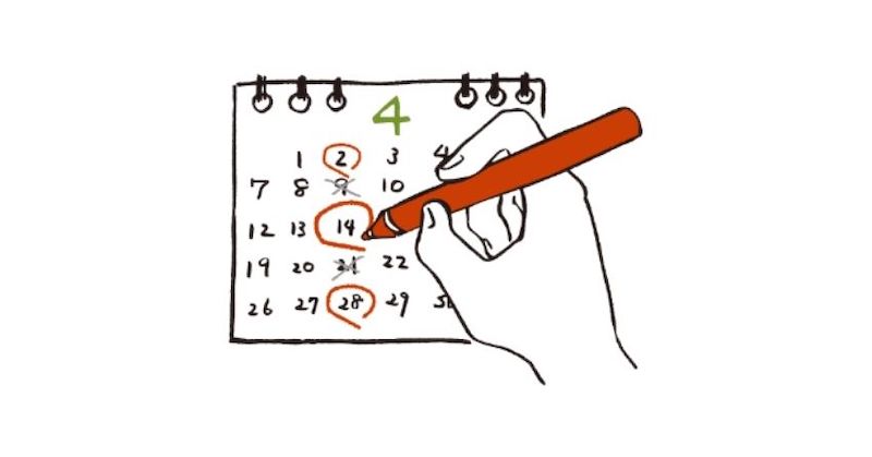 カレンダーの日にちに赤い丸をつけている図